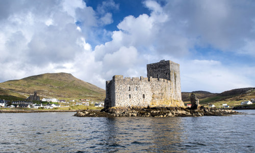 General view of Kisimul Castle taken from a boat
