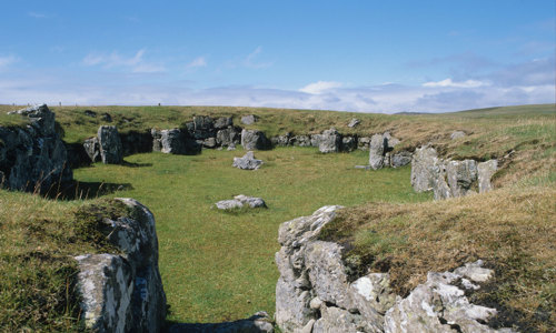 A stone path leading into an uncovered neolithic hall