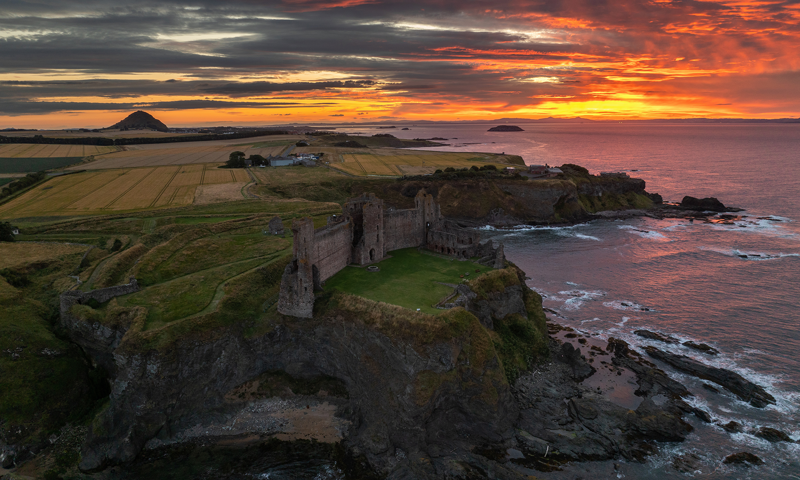 Aerial view of Tantallon Castle during a late summer sunset